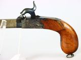 an old gun with a wooden handle and a wooden handle