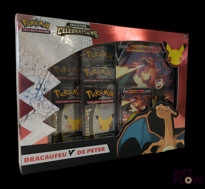 a box of pokemon cards with a picture of a dragon