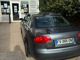 a car that is parked in front of a building