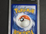 a close up of a pokemon card on a table