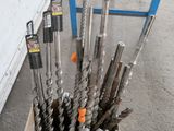 many different types of drill bits in a box