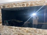 un homme se prenant en photo dans le miroir