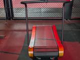 a small table with a bench in the middle of the room