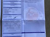 a close up of a paper with a ticket on it