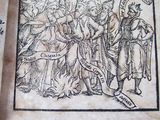 an old book with a picture of a group of people on it