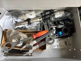 a box full of tools that are sitting on a table