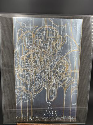 a glass display case with a drawing of a tree inside of it