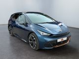 the blue car is parked in a large room with a white wall