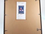 a picture of a baseball player hanging on a bulletin board