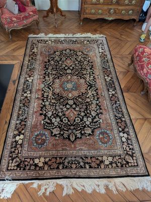 a large rug on the floor in a living room