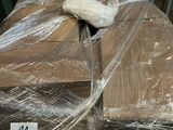 a pile of boxes wrapped in plastic and wrapped in plastic