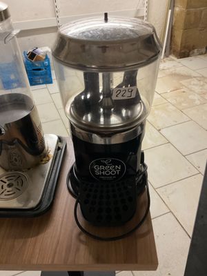 a blender that is sitting on a table in the kitchen
