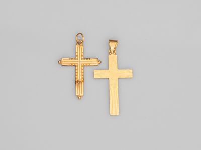 deux croix dorées sur fond gris