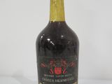 a bottle of wine that is sitting on a table
