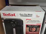 a box of tefa easy fry mega air fryer on the shelf