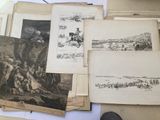 many old books on a table with pictures on them