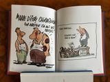 an open book with a cartoon of a man and a woman