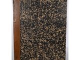 a black and gold marble book with a brown leather cover