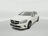 a white car in a white room with a white floor