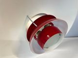 a red and white light that is on the wall