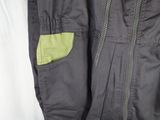 a close up of a jacket hanging on a clothes rack