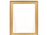 a gold picture frame on a white wall with a white background