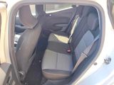 the back seats of a car are empty in the parking lot