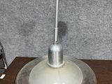 a lamp that is sitting on top of a wooden table