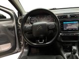 the interior of a car with a steering wheel, dashboard, and dash board