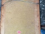 a picture of a piece of old paper on a table