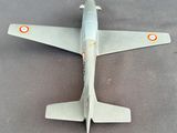 a model of a fighter jet sitting on a table