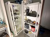 an image of a kitchen with an open refrigerator