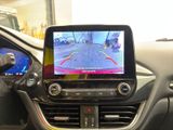 a picture of a car dashboard with a camera on it