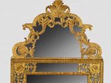 a mirror that is sitting on a table with a mirror on it