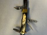 a knife that is laying on top of a table
