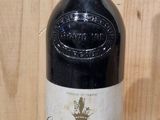 a bottle of wine that is sitting on a table