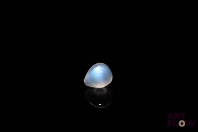an image of a blue moons stone on a black surface