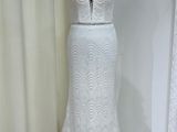 the wedding dress is displayed on a mannequin mannequin mannequin mannequin mannequin mannequin mannequin mannequin mann