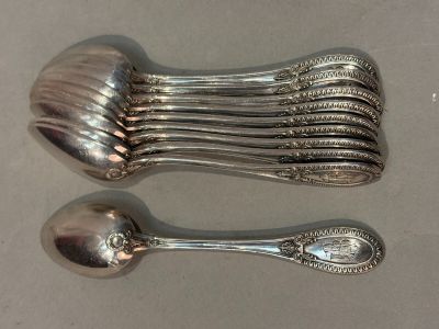 a lot of spoons that are sitting on a table