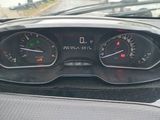 a close up of a car dashboard with a speedometer and gauges