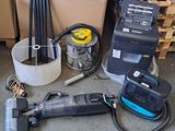 a lot of tools that are laying out on the floor