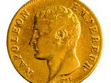 l'image d'une pièce d'or sur laquelle figure le visage d'un homme