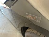 a close up of a car with a ruler on the side of it