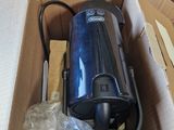 a box with a vacuum in it on a table