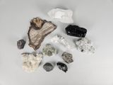 many different types of rocks and stones on the table