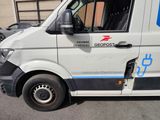 a van that is parked on the side of the street