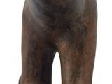 a small statue of a bear on a white background