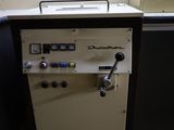 a machine that is sitting in the corner of a room