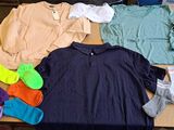 a pile of clothes and socks on a table