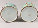 pair of chinese porcelain vases with flowers and birds on them